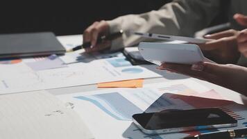 Team of business people working together in the meeting room office, teamwork background charts and graphs banner, double exposure successful teamwork,business planning concept. video