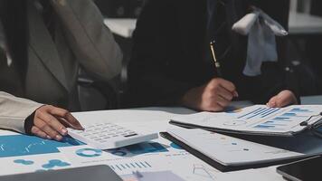 Team of business people working together in the meeting room office, teamwork background charts and graphs banner, double exposure successful teamwork,business planning concept. video