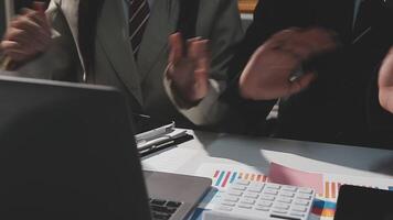 Team of business people working together in the meeting room office, teamwork background charts and graphs banner, double exposure successful teamwork,business planning concept. video