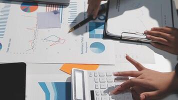 Team of business people working together in the meeting room office, teamwork background charts and graphs banner, double exposure successful teamwork,business planning concept. video