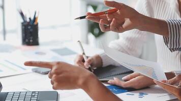 Team of business people working together in the meeting room office, teamwork background charts and graphs banner, double exposure successful teamwork,business planning concept. video