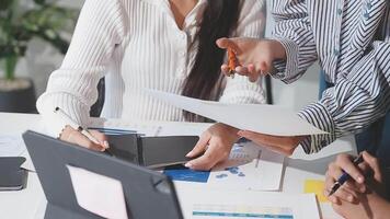 Team of business people working together in the meeting room office, teamwork background charts and graphs banner, double exposure successful teamwork,business planning concept. video