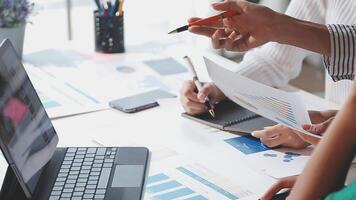 Team of business people working together in the meeting room office, teamwork background charts and graphs banner, double exposure successful teamwork,business planning concept. video
