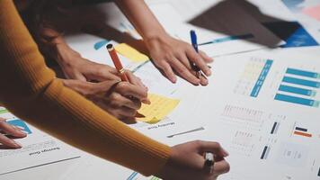 Team of business people working together in the meeting room office, teamwork background charts and graphs banner, double exposure successful teamwork,business planning concept. video