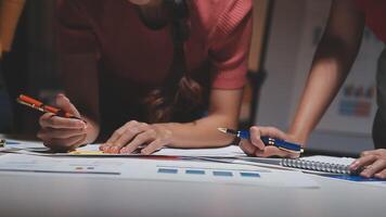 Team of business people working together in the meeting room office, teamwork background charts and graphs banner, double exposure successful teamwork,business planning concept. video