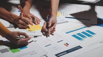 Team of business people working together in the meeting room office, teamwork background charts and graphs banner, double exposure successful teamwork,business planning concept. video