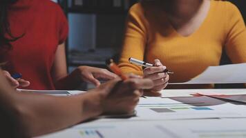Team of business people working together in the meeting room office, teamwork background charts and graphs banner, double exposure successful teamwork,business planning concept. video