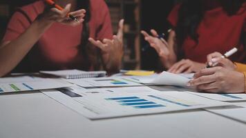 Team of business people working together in the meeting room office, teamwork background charts and graphs banner, double exposure successful teamwork,business planning concept. video