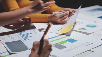 Team of business people working together in the meeting room office, teamwork background charts and graphs banner, double exposure successful teamwork,business planning concept. video