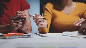 Team of business people working together in the meeting room office, teamwork background charts and graphs banner, double exposure successful teamwork,business planning concept. video