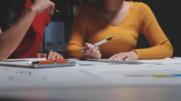 Team of business people working together in the meeting room office, teamwork background charts and graphs banner, double exposure successful teamwork,business planning concept. video