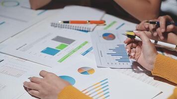 Team of business people working together in the meeting room office, teamwork background charts and graphs banner, double exposure successful teamwork,business planning concept. video