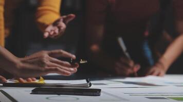 Team of business people working together in the meeting room office, teamwork background charts and graphs banner, double exposure successful teamwork,business planning concept. video