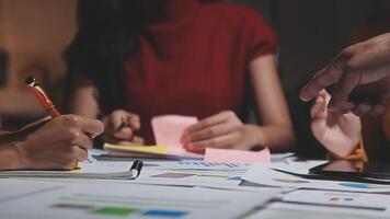Team of business people working together in the meeting room office, teamwork background charts and graphs banner, double exposure successful teamwork,business planning concept. video