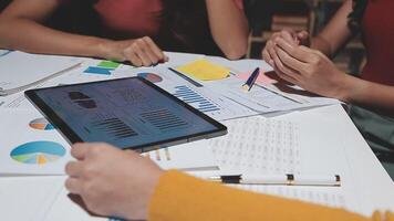 Team of business people working together in the meeting room office, teamwork background charts and graphs banner, double exposure successful teamwork,business planning concept. video