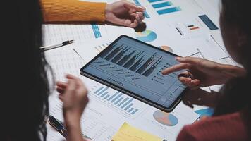 Team of business people working together in the meeting room office, teamwork background charts and graphs banner, double exposure successful teamwork,business planning concept. video