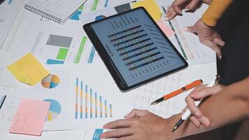 Team of business people working together in the meeting room office, teamwork background charts and graphs banner, double exposure successful teamwork,business planning concept. video