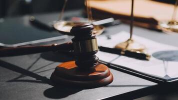Judge gavel with Justice lawyers having team meeting at law firm background. Concepts of Law and Legal services. video