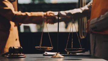 Judge gavel with Justice lawyers having team meeting at law firm background. Concepts of Law and Legal services. video