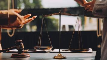Judge gavel with Justice lawyers having team meeting at law firm background. Concepts of Law and Legal services. video