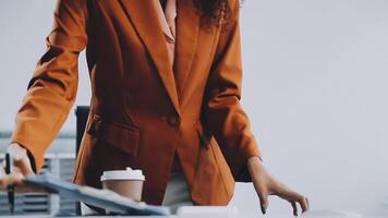 Business meetings to analyze investment strategies and brainstorm sales plans for a more profitable business. video