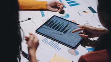 Business meetings to analyze investment strategies and brainstorm sales plans for a more profitable business. video