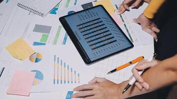 Business meetings to analyze investment strategies and brainstorm sales plans for a more profitable business. video