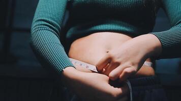 A woman who touches the belly meat, diet image video