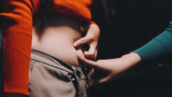 A woman who touches the belly meat, diet image video