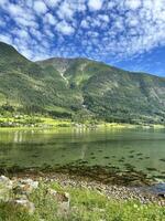 The enchanting beauty of crystal clear water in a mountain lake in Norway. photo