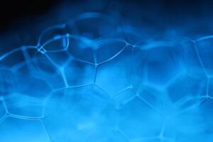 Blue bubbles in macro, connection of bubbles in macro, cell from liquid, molecules connection photo
