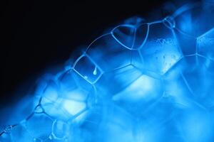 Blue bubbles in macro, connection of bubbles in macro, cell from liquid, molecules connection photo