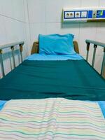Hospital bed in recovery room with copy space.3d rendering photo