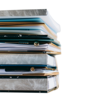 Stack of folders and documents on office desk against transparent background png