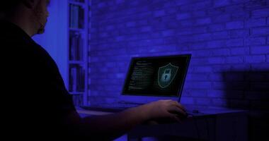 Young man running a cyber security software video