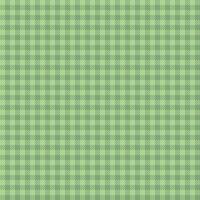 Plaid check pattern in green color. Seamless fabric texture. Tartan textile print. vector