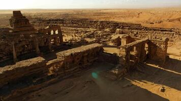 Ancient ruins in the desert landscape The ruins consist of crumbling stone structures and remnants of a once great civilization. video