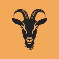 Black silhouette of a goat head with big horns facing forward on an orange background vector