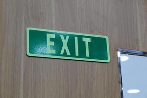 Exit Sign on the Building wall photo