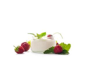 homemade sweet yogurt in a jar with strawberries, isolated on white background photo