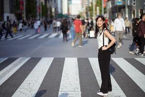 Dynamic crossing, Unseen faces on the move in Tokyo, a testament to the bustling energy of the city. photo