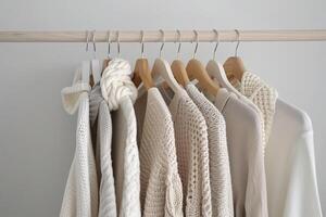 Close up of hanging clothes hang on wooden hangers generated by AI photo