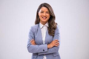 Portrait of cheerful businesswoman who is looking at camera and smiling. photo