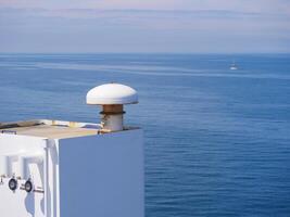 Details of the ship close-up against the background of the sky and sea. Route from Frederikshavn, Denmark to Gothenburg, Sweden organized by the Stena Line ferry company photo