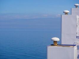 Details of the ship close-up against the background of the sky and sea. Route from Frederikshavn, Denmark to Gothenburg, Sweden organized by the Stena Line ferry company photo