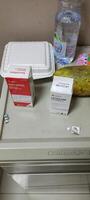 Central Java, Indonesia. May 17th, 2024 - Various kinds of medicines, supplements, mineral water and fruit are available on the tables in hospital patients' rooms photo