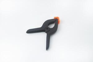The clamp used to clamp the background is above the white background photo