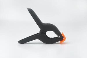 Photo of a clamp clamping on a white background
