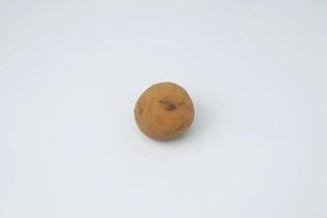 One round potato on a white background photo