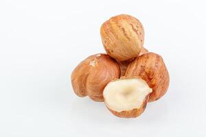 macro hazelnuts nuts on a white background photo